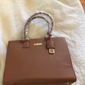 Joy and Imani luggage leather tote bag